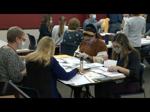 Election workers in Pennsylvania count mail-in ballots in US election