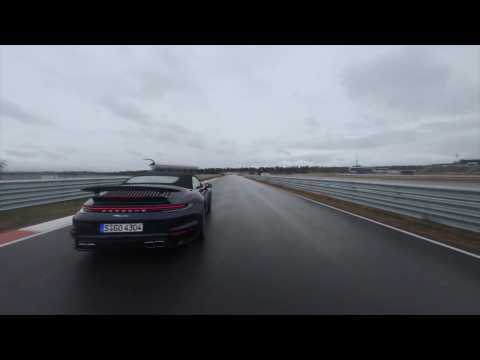 The new Porsche 911 Turbo Cabriolet in Night Blue Driving Video