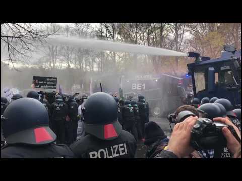 Police fire water cannon to disperse Berlin anti-shutdown protest
