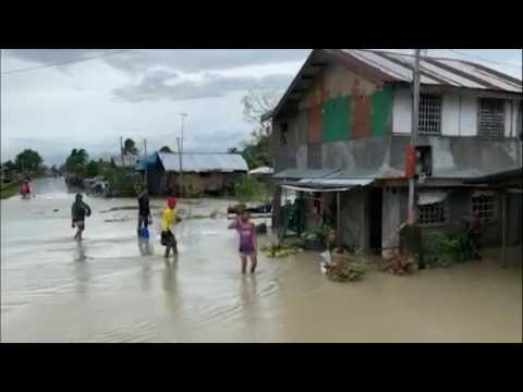 Tropical storm Molave leaves flooded streets in Philippine town