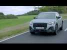 The new Audi Q2 in Arrow gray Driving Video