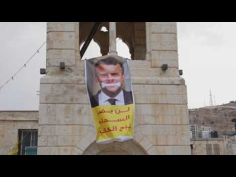 Palestinians protest Macron's comments on cartoons of the Prophet Muhammad