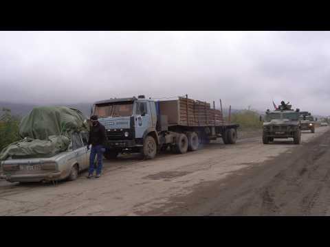 Armenian police and Russian peacekeepers on the new border line between Armenian and Azerbaijani sides