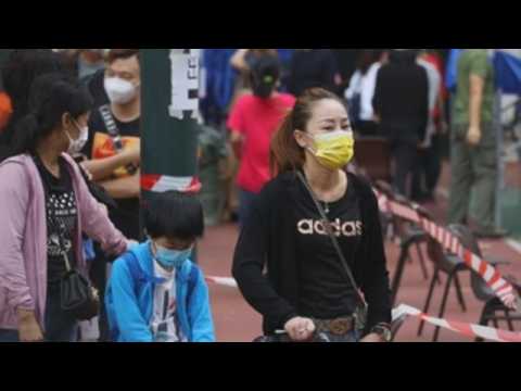 Hong Kong residents queue to get coronavirus test