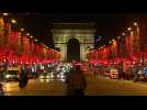 Brussels decorates its Christmas tree as famous Paris avenue is lit up