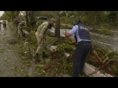 Fallen palm trees, waterlogged streets after Hurricane Delta thrashes Mexico's Cancun