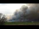Wildfires sparked by munition depot explosions in Russia