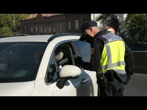 Police patrol outskirts of Madrid to prevent non-essential travel