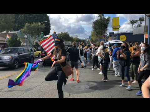 Jubilant scenes in streets of West Hollywood after Biden declared president