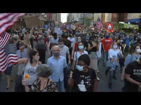 New Yorkers celebrate Biden win in streets