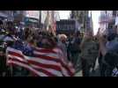 People celebrate Joe Biden's victory in New York's Times Square