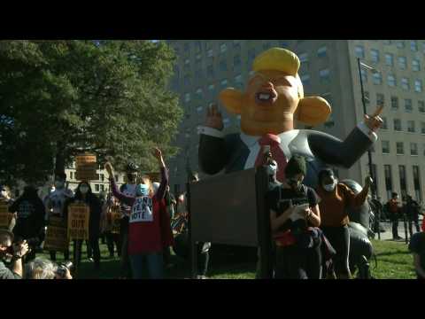 Anti-Trump demonstrators rally near White House