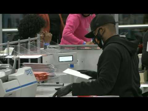 Vote counting continues in Georgia's Fulton County as key state is "to close to call"