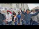 Dozens march in Tunis against French president over Mohammed cartoons