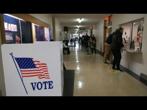 Voters cast early ballots in Kenosha, Wisconsin, ahead of Election Day