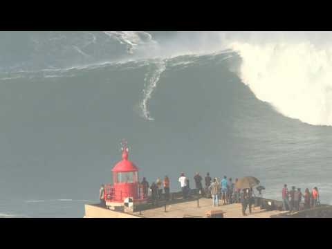 Big wave surfers try to ride giant swell in Nazaré