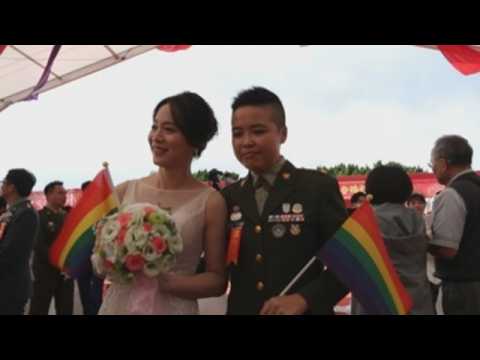 Two LGBT couples get married in Taiwan's military mass wedding
