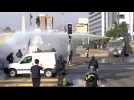 Chielan police use water cannons against protesters in Santiago