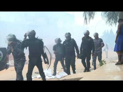 Ivory Coast police fire teargas at protesters where president voted