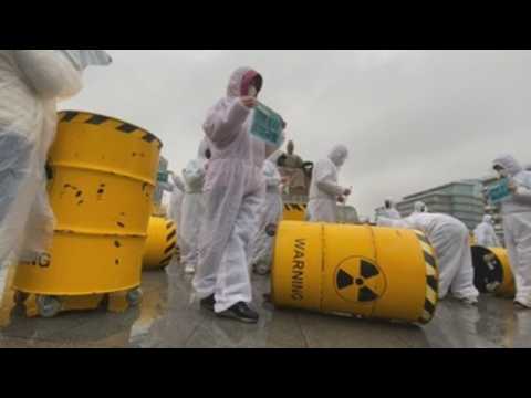 Environmental activists protest against nuclear power in Seoul