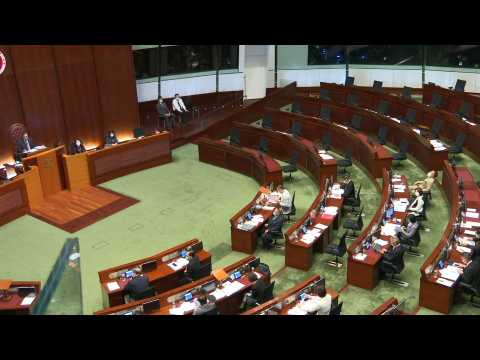 Hong Kong legislature sits without democrats after exodus