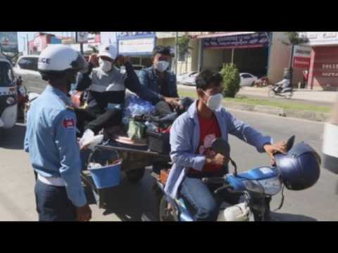 Authorities distribute free masks in Phnom Penh