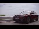 The BMW iX in Red Driving Video