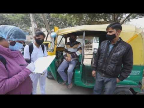 Volunteers carry out surveys in New Delhi to evaluate COVID-19 situation
