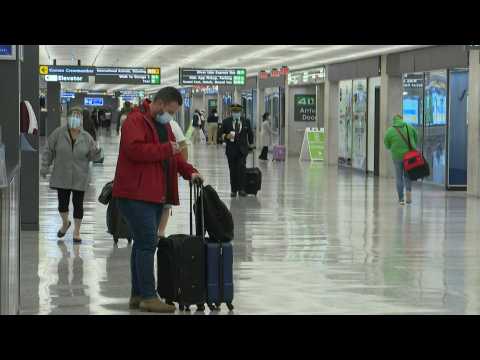 Travellers arrive at Dulles International Airport ahead of Thanksgiving despite virus guidelines