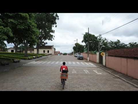 With a speaker on his bike, man raises virus awareness in Brazil's only zero-case town