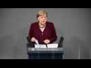 Merkel defends decision to tighten Covid measures