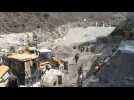 Images of India dam damaged by deadly flood after glacier burst