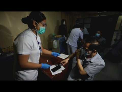 Health workers in Philipines participate in COVID-19 vaccine delivery and administration drill