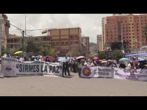 Bolivian doctors march on the twelfth day of their strike