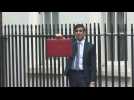 UK Finance Minister leaves 11 Downing St to deliver budget