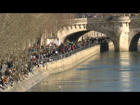 Parisians enjoy sunny weather as lockdown threat looms