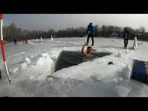 Czech freediver breaks world record for longest swim under ice