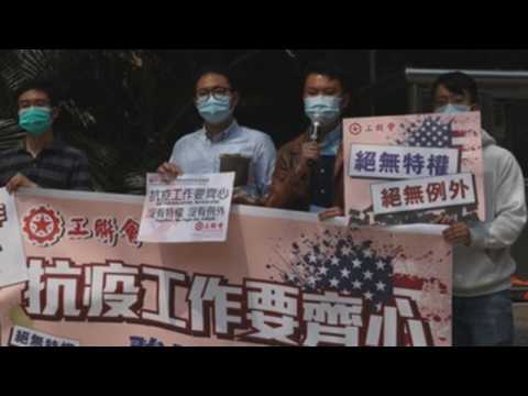Protest outside US consulate in Hong Kong following positive COVID-19 cases
