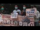 Protest outside US consulate in Hong Kong following positive COVID-19 cases