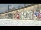 Snow covers Berlin Wall as Europe hit by cold snap