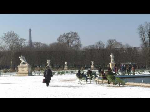 Snow falls on Paris's Tuileries gardens