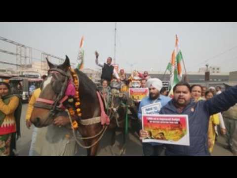 Congress party members protest against central government in northern India