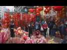 Market in Hong Kong welcomes shoppers on Lunar New Year's Eve