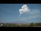 Mount Etna spews smoke and ash