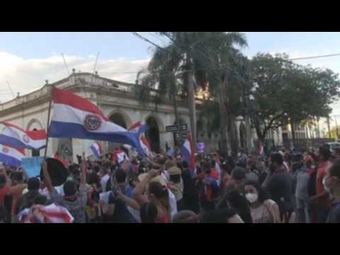 Protesters and police clash in Paraguay amid anger over COVID-19 management