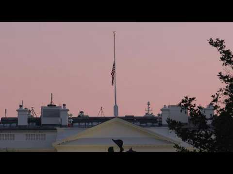 White House flag flies at half mast to honor 500,000 Covid deaths