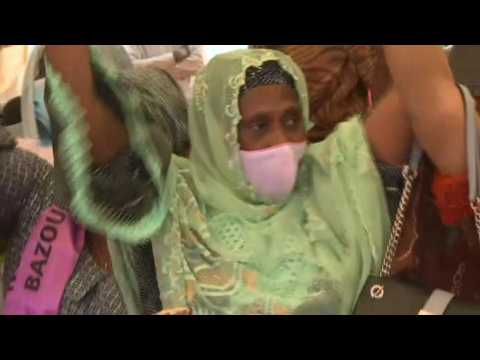 Niger election victor Bazoum supporters celebrate at party HQ