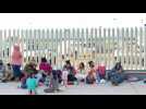 Hundreds of asylum seekers wait at Tijuana border, hoping to reach US