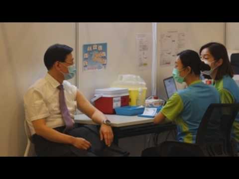 Hong Kong leader, top officials receive COVID-19 vaccines