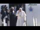 Pope Francis boards his flight at the end of his historic trip to Iraq